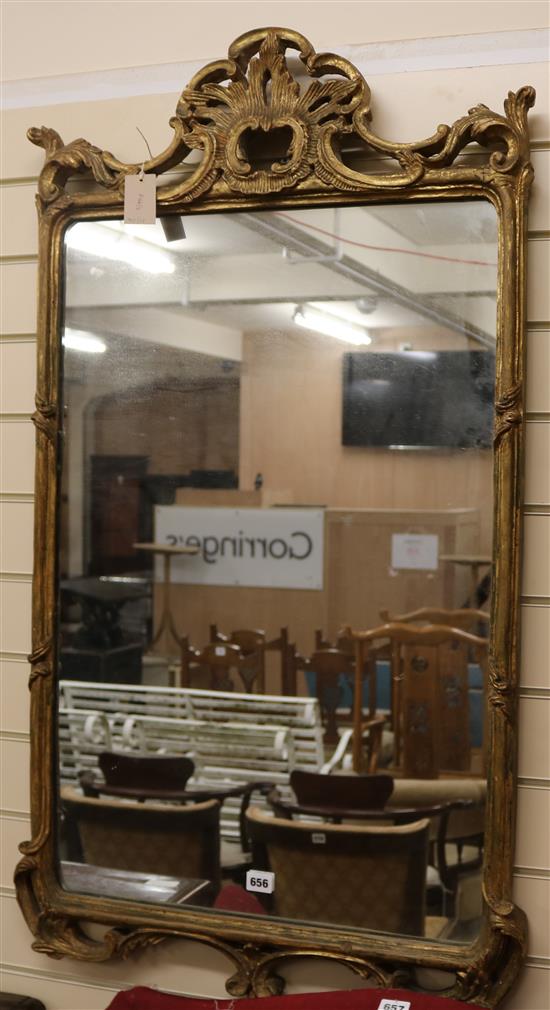 A decorative gilt framed wall mirror H.113cm